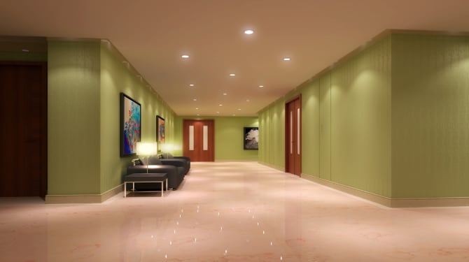 Completed painted hotel lounge area project with light ceiling and green walls