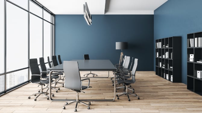 Luxury meeting room painting project with light ceiling and dark blue walls