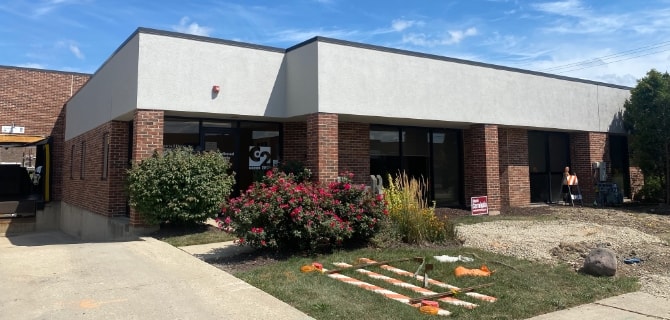 office building stucco exterior repainting
