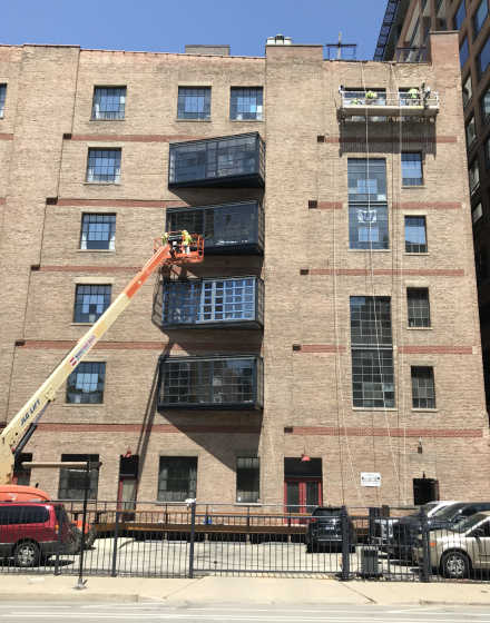 HOA building exterior windows painting in Chicago project photo