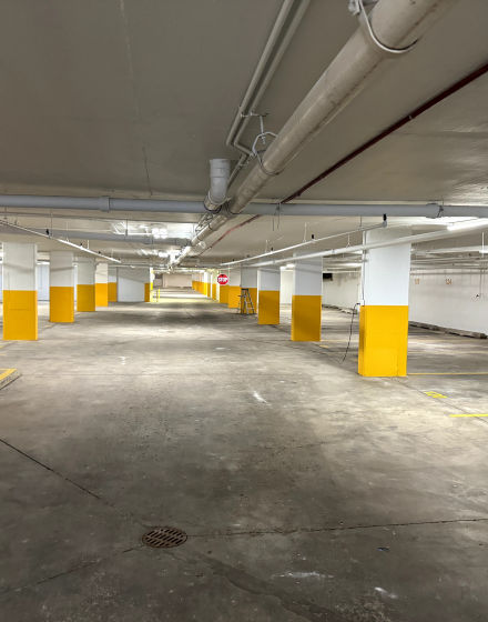 Underground parking garages interior painting and parking spot numbering project in Lincolnwood project photo 1