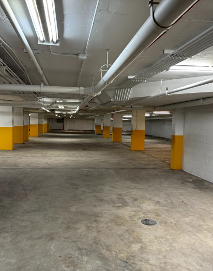 Underground parking garages interior painting and parking spot numbering project in Lincolnwood project photo 3