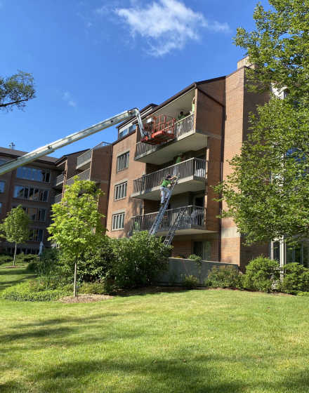 HOA building balconies painting in Park Ridge project photo
