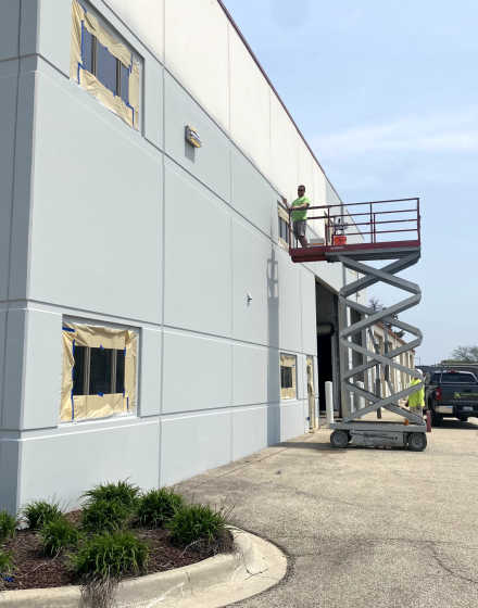 Warehouse interior and exterior painting in Oswego project photo