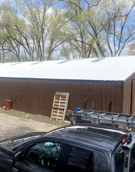 Golf course maintenance warehouse roof painting in Elmhurst project photo 2